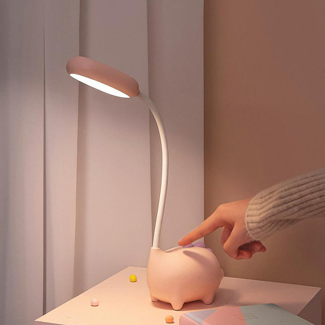 Różowa lampka na biurko świnka