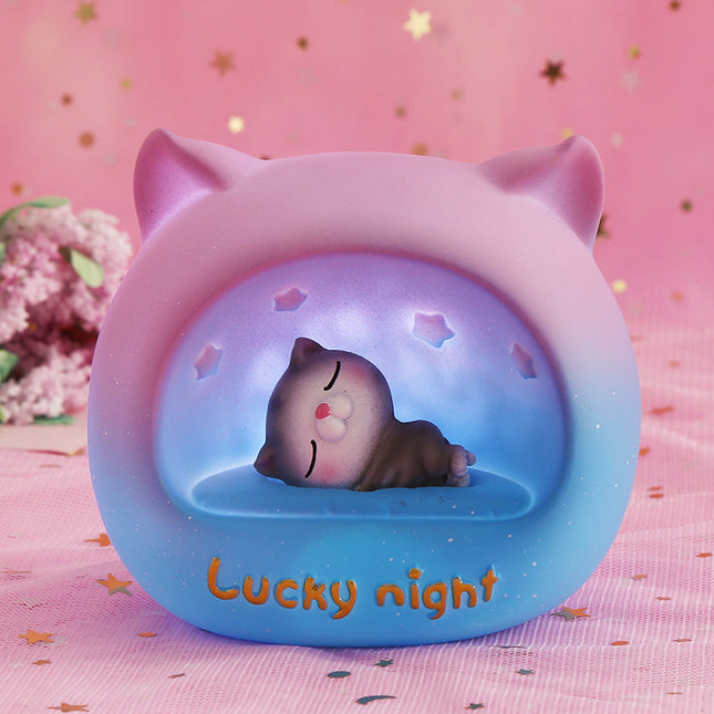 Okrągła lampka nocna LED śpiący kotek