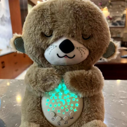 Świecąca pluszowa maskotka śpiąca wydra