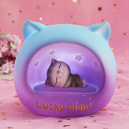 Okrągła lampka nocna LED śpiący kotek