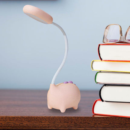 Różowa lampka na biurko świnka