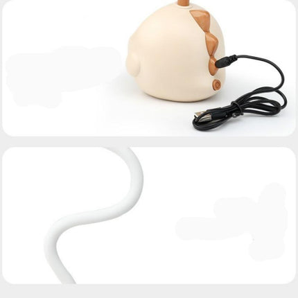 Różowa lampka LED dinozaur na biurko