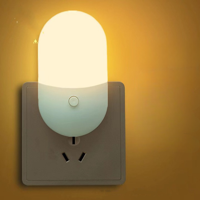 Lampka nocna LED do gniazdka dwukolorowa