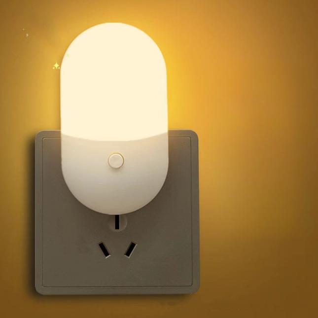 Lampka nocna LED do gniazdka dwukolorowa